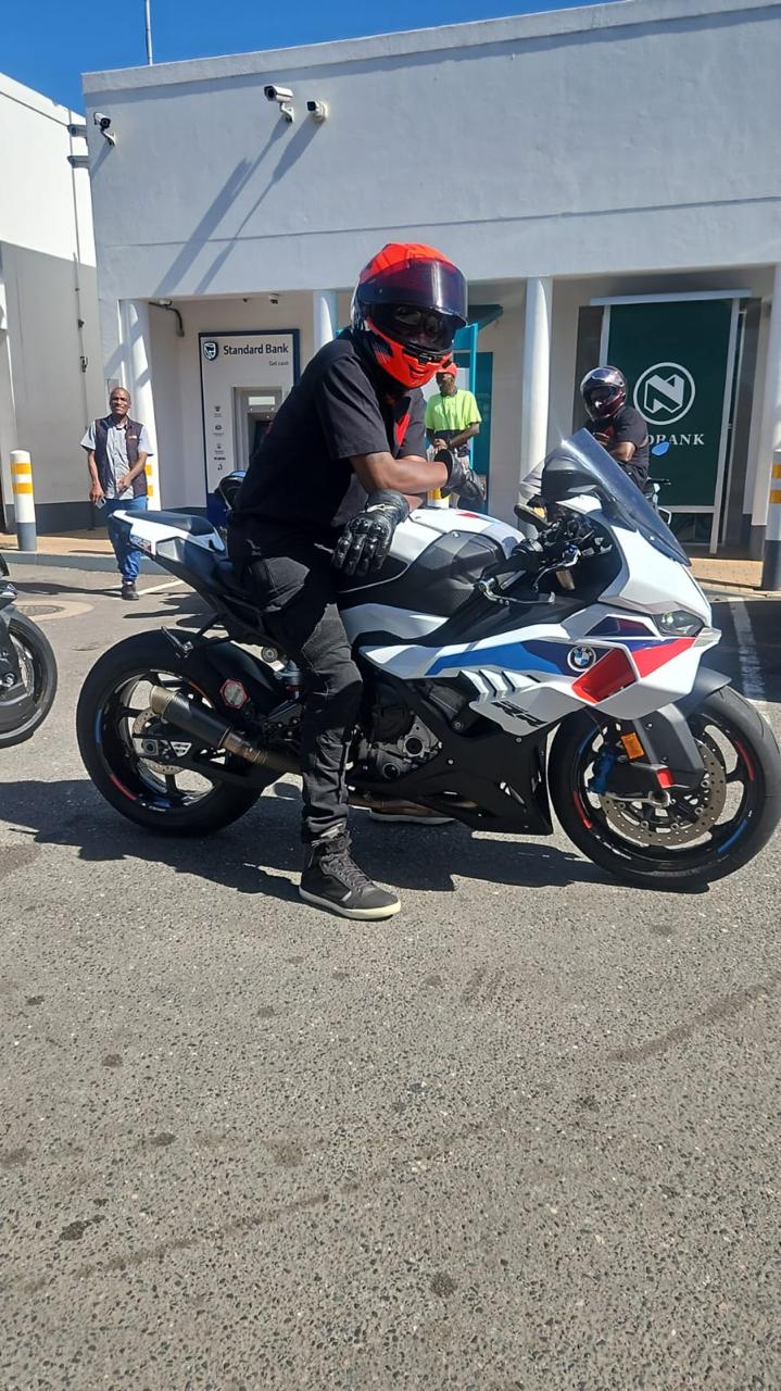 BMW S1000RR in M Sport colours with rider