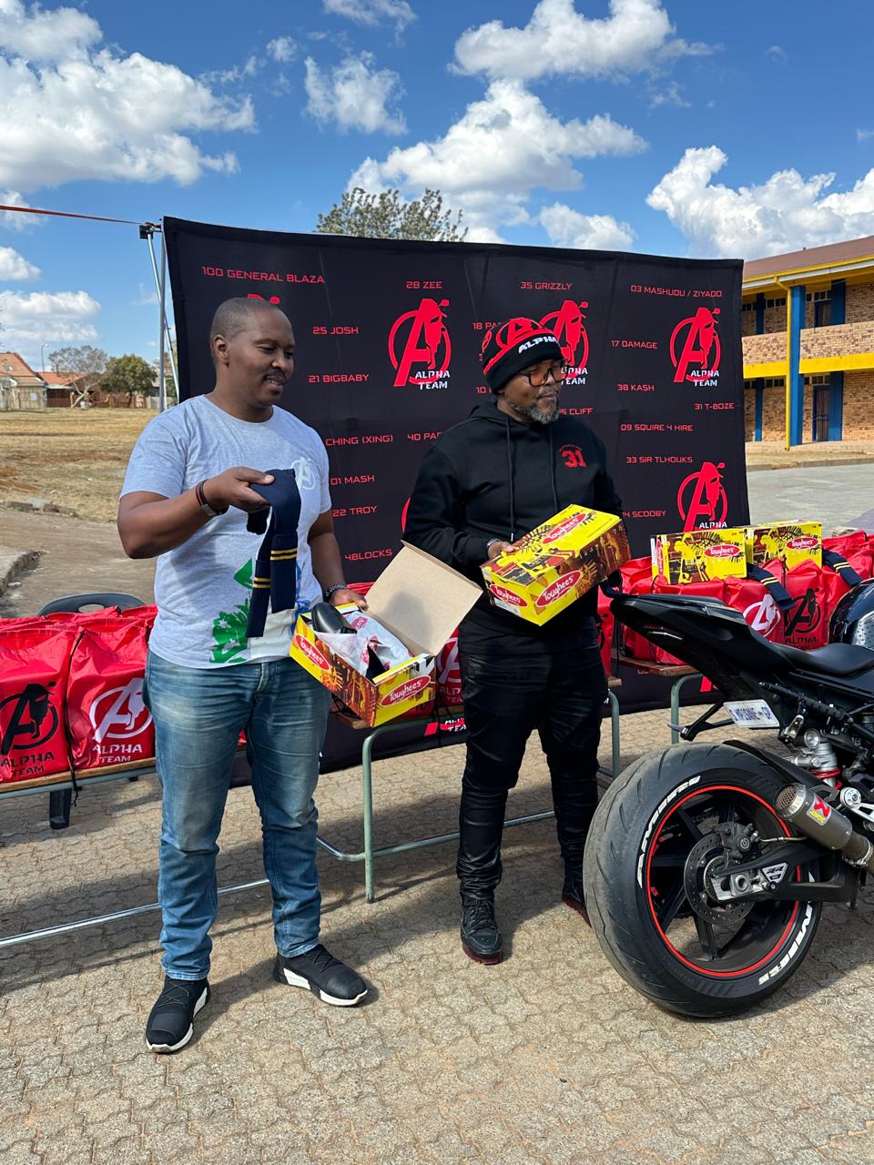 Handing over school shoes and socks